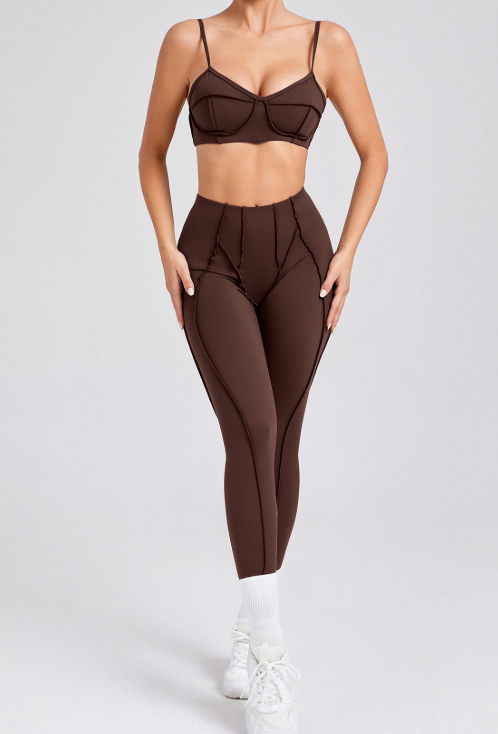 Women’s activewear underwear in assorted styles—seamless thongs, briefs, bikini cuts—laid on a gym bench, highlighting performance fabric and comfort.