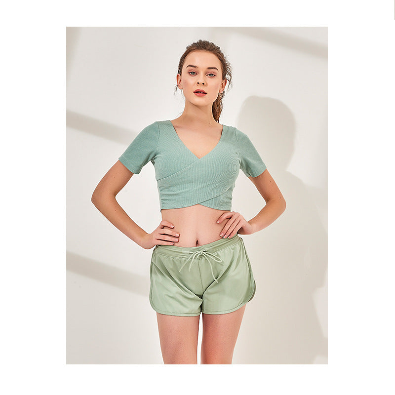 Tenue de sport à manches courtes, idéale pour la course, le yoga et le yoga. Soutien-gorge court à col V croisé.