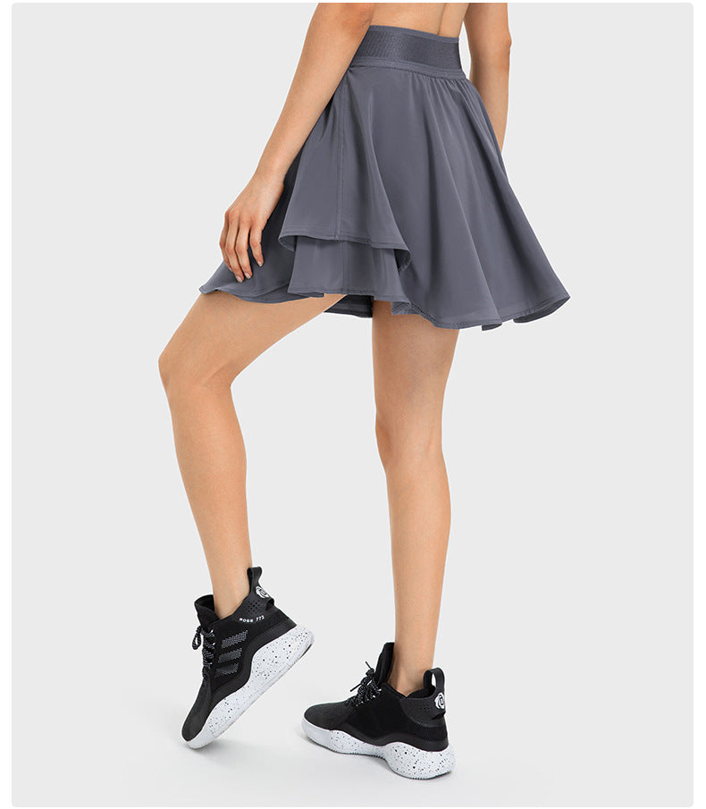 Short de tennis deux pièces pour femme, respirant, à séchage rapide et respirant, avec doublure et poche latérale, protection anti-décoloration.