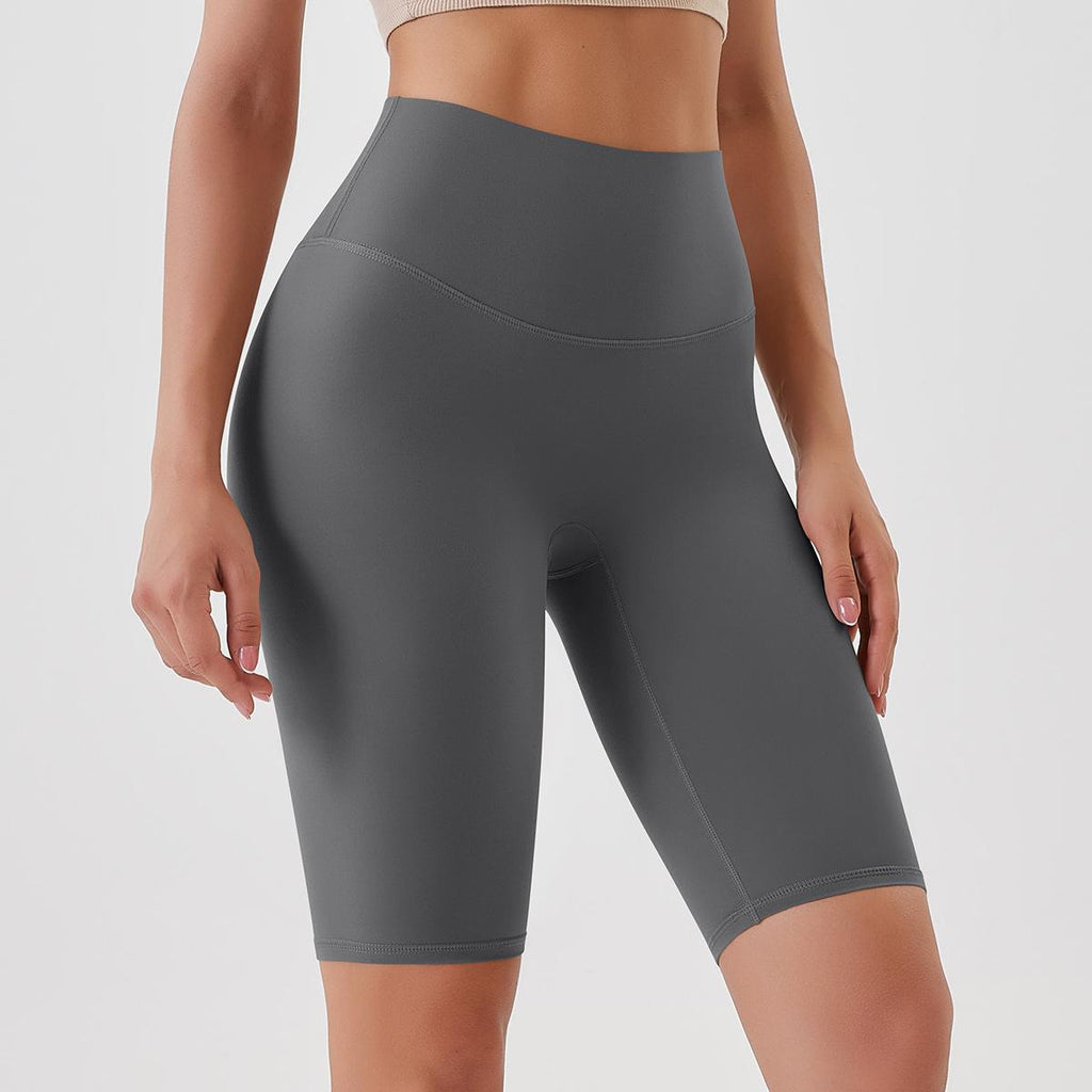 Pantalones de yoga ajustados con efecto piel color melocotón, cintura alta, realce de cadera, leggings deportivos