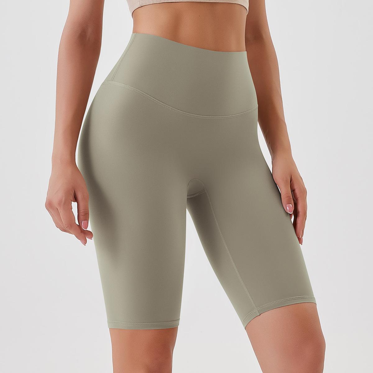 Pantalones de yoga ajustados con efecto piel color melocotón, cintura alta, realce de cadera, leggings deportivos