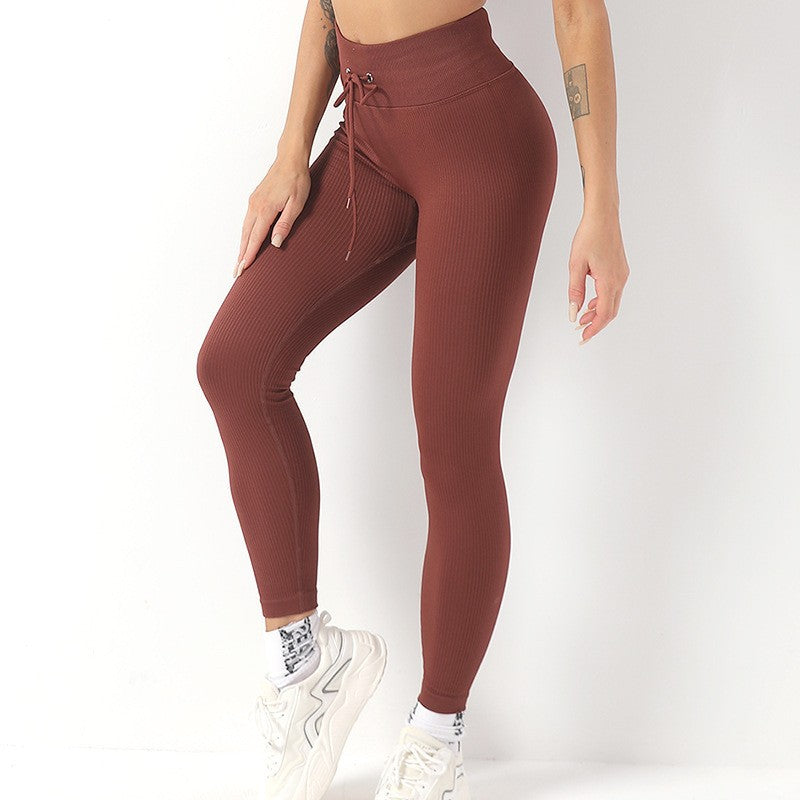 Pantalones de yoga largos con cordón ajustable para mujer, ropa exterior para levantar la cadera, pantalones de yoga para fitness, pantalones deportivos sexys de color melocotón para la cadera.