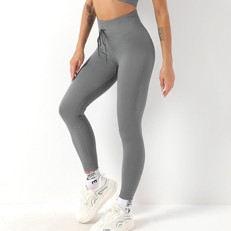 Pantalones de yoga largos con cordón ajustable para mujer, ropa exterior para levantar la cadera, pantalones de yoga para fitness, pantalones deportivos sexys de color melocotón para la cadera.