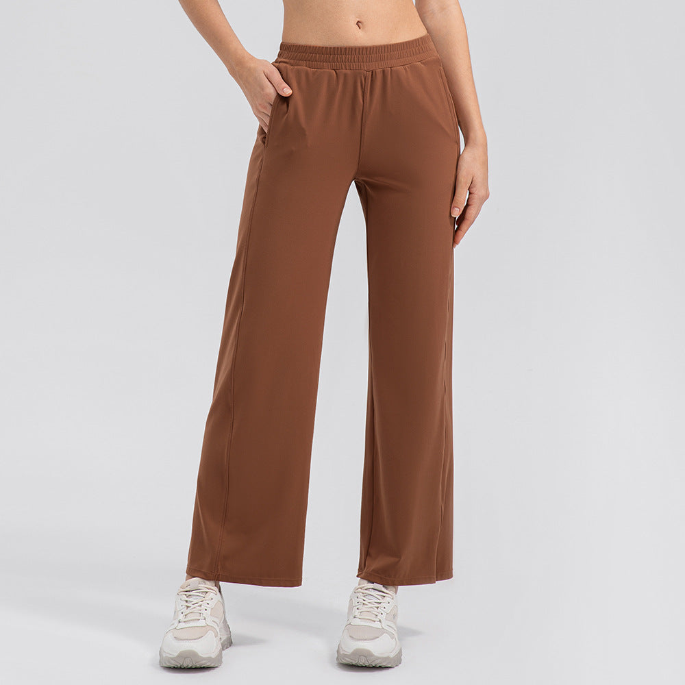 Pantalon de yoga ample effet seconde peau, taille haute, jambes larges et drapées, très élastique, collection Breathing Series.