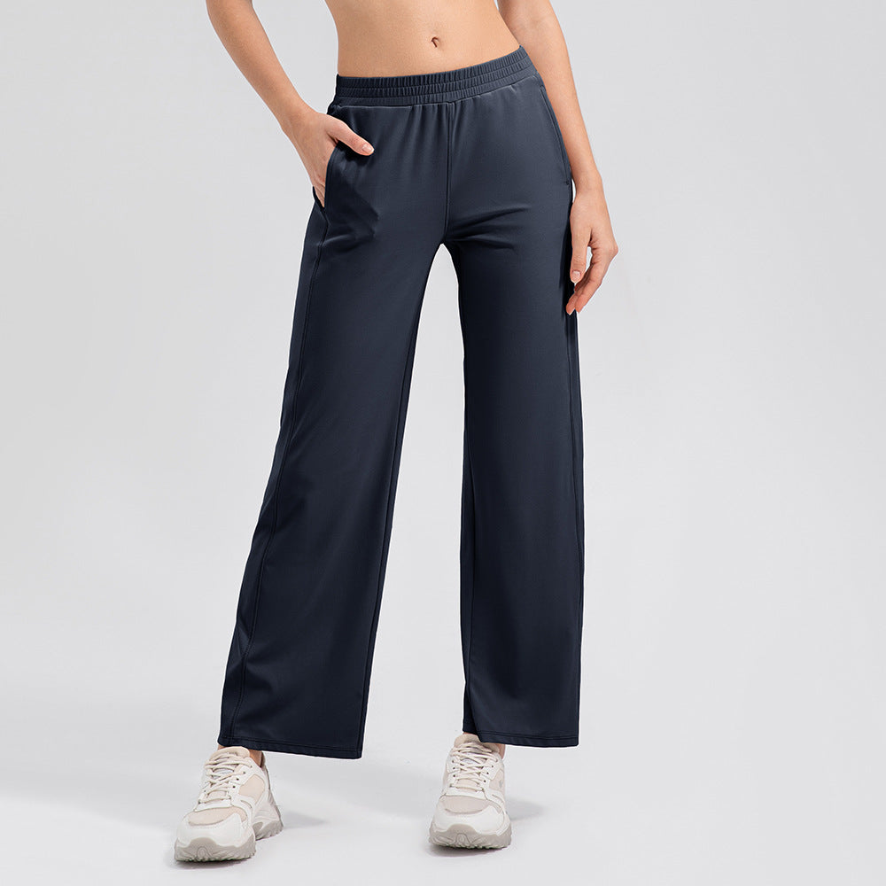 Pantalon de yoga ample effet seconde peau, taille haute, jambes larges et drapées, très élastique, collection Breathing Series.