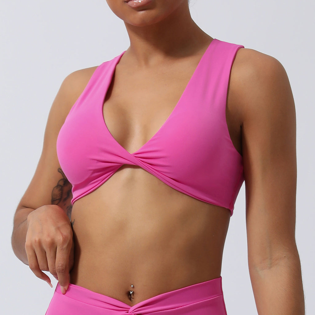 Soutien-gorge de yoga push-up antichoc Twist avec coussinets de poitrine pour femmes, idéal pour l'entraînement en salle et les séances d'entraînement à domicile.