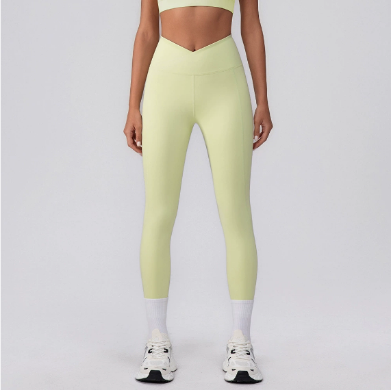 Pantalones de yoga de secado rápido sin costuras para mujer, pantalones deportivos de cintura alta con realce de cadera y efecto melocotón.