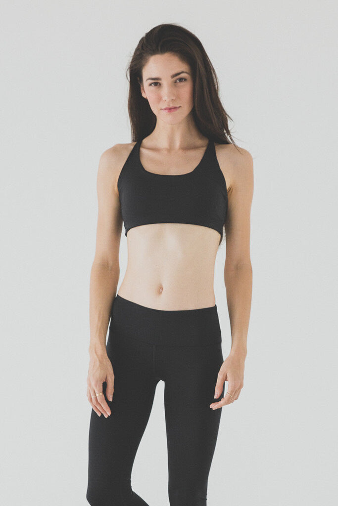 Soutien-gorge de sport avec soutien dorsal croisé pour femme, idéal pour la course et le yoga, respirant et évacuant l'humidité.