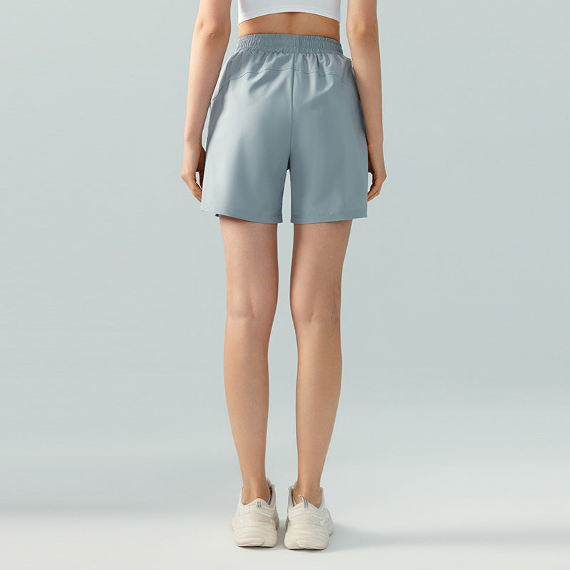 Pantalones cortos deportivos de cuatro puntos para mujer, ropa de trabajo, holgados, informales, para correr, entrenar, yoga y fitness, para primavera y verano