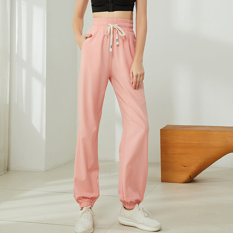 Pantalones deportivos informales para correr y fitness, holgados y cómodos, con cordón y cintura alta para mujer, con realce de cadera y tacto color piel.