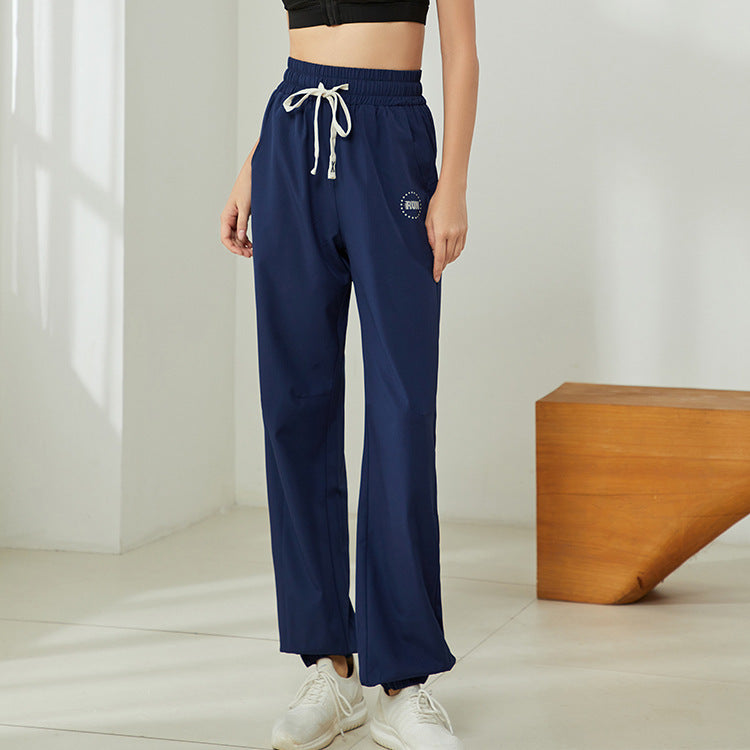 Pantalones deportivos informales para correr y fitness, holgados y cómodos, con cordón y cintura alta para mujer, con realce de cadera y tacto color piel.