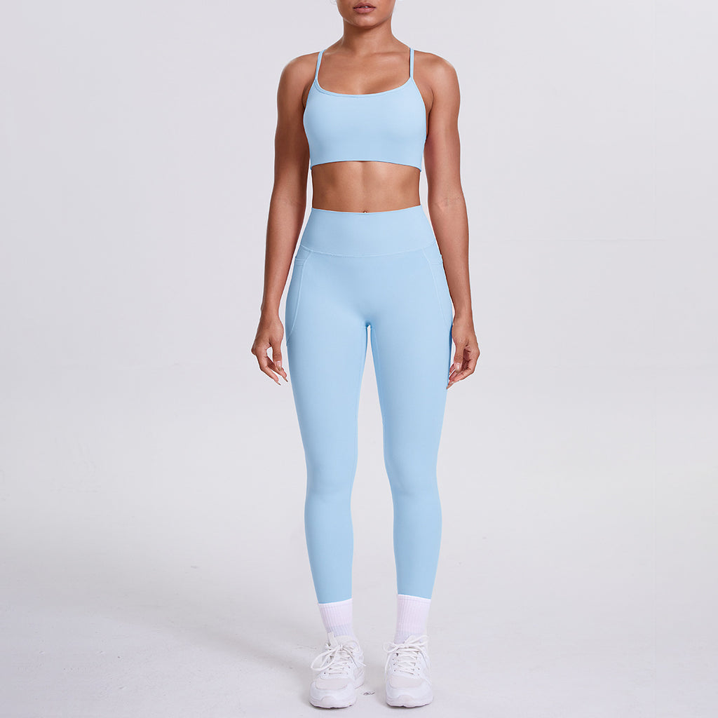 Pantalon de sport effet seconde peau, poches, dos nu galbant, idéal pour la course, le fitness et le yoga.