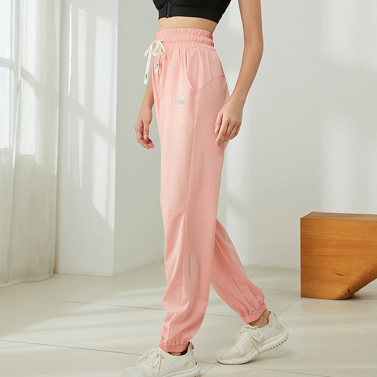 Pantalones deportivos informales para correr y fitness, holgados y cómodos, con cordón y cintura alta para mujer, con realce de cadera y tacto color piel.